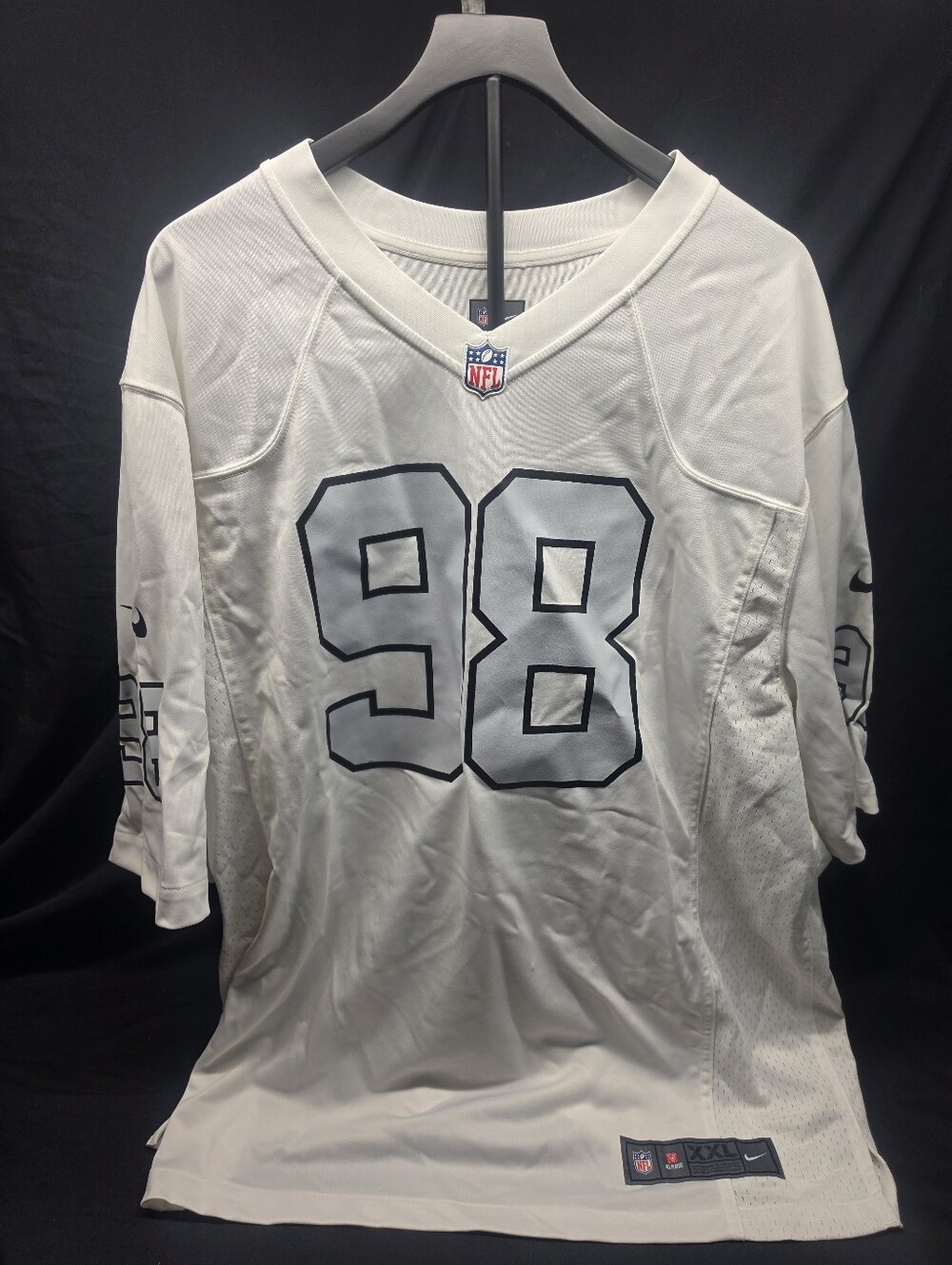 Nike NFL On-Field Maxx Crosby #98 Las Vegas Raiders white alternate jersey.